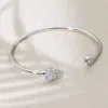 Fashnzfab Rhodium Plated Cz Stone Clover Tip Cuff Bracelet Silver In Silver