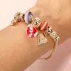 Fashnzfab Romantic Triple Heart Charm Multi Bead Bracelet Gold, Red In Multi