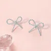 Fashnzfab Rope Brass Metal Wire Bow Knot Stud Earrings - Rhodium In Metallic