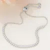 Fashnzfab Round Cz Stone Bezel Adjustable Pull Tie Bracelet Clear, Silver In Silver