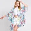 Fashnzfab Ruffle Lined Flower Print Open Front Crochet Cover-up Kimono Poncho In Blue
