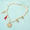 Fashnzfab Seashell Coral Charm Natural Stone Beaded Statement Necklace In Gold
