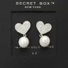 Fashnzfab Secret Box_14k Gold Dipped Cz Stone Paved Heart Accent Pearl Dangle Earrings In Metallic