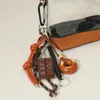 Fashnzfab Secret Box_chocolate Pretzel Bread Faux Leather Knot Mixed Charm Bag Accessory In Brown