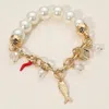 Fashnzfab Secret Box_fish Dice Chili Charm Pearl Beaded Stretch Bracelet Gold In Gold