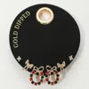 Fashnzfab Secret Box_gold Dipped Stone Bow Festive Wreath Stud Earring Set In Gold