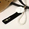 Fashnzfab Secret Box_pearl Beaded Wristlet Flower Lady Velvet Strap Bag Charm / Keychain In Gold