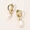 Fashnzfab Secret Box_stainless Steel Knot Pearl Drop Earrings In Gold