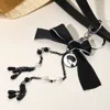 Fashnzfab Secret Box_vintage Cameo Bow Pearl Chain Bag Charm / Keychain In Gold