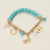 Fashnzfab Secret Box_western Horse Horse Shoe Cowboy Hat Pearl Charm Beaded Stretch Bracelet Gold In Gold