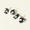 Fashnzfab Seed Beaded Bow Earrings In Multi