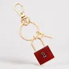 Fashnzfab Semi Precious Lock Keychain / Bag Charm In Gold