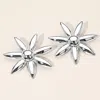 Fashnzfab Shiny Metal Bold Floral Earrings In Silver