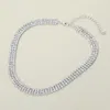 Fashnzfab Silver Dipped Triple Row Rhinestone Necklace In Metallic