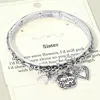 Fashnzfab Sister Message Bow Heart Charm Stretch Bracelet In Silver