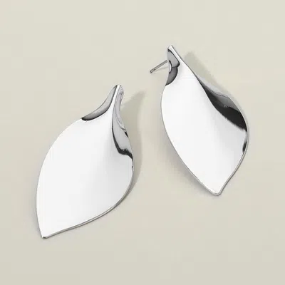 Fashnzfab Sleek Metal Leaf Statement Earrings In Silver