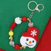 Fashnzfab Snowman Plush Doll Pointed Charm Beaded Stretch Christmas Keychain In Multi