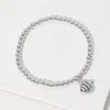 Fashnzfab Stainless Steel Ball Stone Paved Fish Charm Beaded Stretch Bracelet Multi, Silver In Metallic