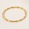 Fashnzfab Stainless Steel Bamboo Hinged Bangle Bracelet Gold In Gold