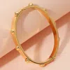 Fashnzfab Stainless Steel Bubble Hinged Bangle Bracelet In Gold