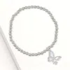 Fashnzfab Stainless Steel Cz Stone Accent Mother Of Pearl Butterfly Charm Stretch Bracelet Mother Of Pearl, Si In Multi