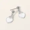 Fashnzfab Stainless Steel Cz Stone Accent Mother Of Pearl Heart Charm Dangle Earrings In Multi