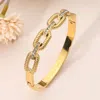 Fashnzfab Stainless Steel Cz Stone Paved Bar Accent Textured Chain Link Hinged Bangle Bracelet - Gold In Gold