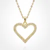 Fashnzfab Stainless Steel Cz Stone Paved Open Heart Pendant Necklace In Gold