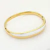 Fashnzfab Stainless Steel Enamel Hinged Bangle Bracelet Gold, White In Multi