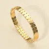 Fashnzfab Stainless Steel Modern Geometric Hinged Bangle Bracelet In Gold