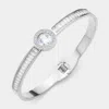 Fashnzfab Stainless Steel Round Stone Accented Baguette Stone Embellished Hinged Evening Bracelet Silver In Silver