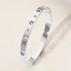 Fashnzfab Stainless Steel Stone Paved Open Flower Cut Out Hinged Bangle Bracelet Silver In Silver