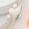 Fashnzfab Stainless Steel Triple Mother Of Pearl Quatrefoil Stone Bezel Pointed Hinged Bangel Bracelet In Gray
