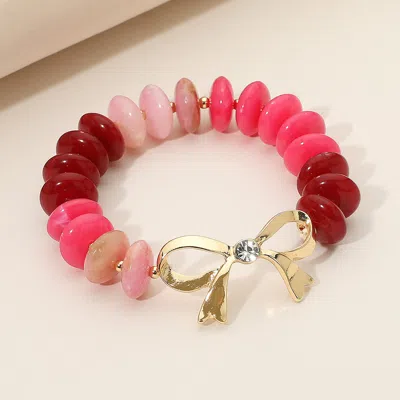 Fashnzfab Stone Accent Metal Bow Accent Flat Resin Disc Beaded Stretch Bracelet In Pink