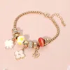 Fashnzfab Stone Accented Clover Charm Multi Bead Bracelet Cream, Gold In Multi