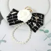 Fashnzfab Stone Cluster Embellished Floral Tweed Bow Pearl Wristlet Keychain / Bag Charm In Black