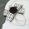 Fashnzfab Stone Cluster Embellished Floral Tweed Bow Pearl Wristlet Keychain / Bag Charm In White