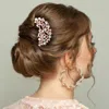 Fashnzfab Stone Embellished Bow Shamrock Hair Comb In Pink