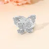 Fashnzfab Stone Paved Butterfly Accent Stretch Ring In Silver