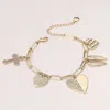 Fashnzfab Stone Paved Cross Heart Wing Charm Station Paperclip Chain Bracelet In Multi