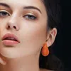 Fashnzfab Stone Paved Curved Teardrop Earrings - Gold, Siam In Orange
