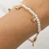 Fashnzfab Stone Paved Flower Metal Heart Charm Station Pearl Beaded Bracelet - Cream, Gold In Gold