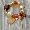 Fashnzfab Stone Paved Heart Charm Accent Pebble Beaded Stretch Bracelet Brown, Gold In Multi