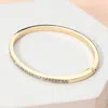 Fashnzfab Stone Paved Hinged Bangle Bracelet In Multi