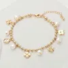 Fashnzfab Stone Paved Metal Floral Pearl Charm Station Beaded Chain Bracelet - Cream, Gold In Gold
