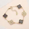 Fashnzfab Stone Paved Natural Stone Quatrefoil Link Bracelet In Gold