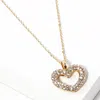Fashnzfab Stone Paved Open Heart Pendant Necklace - Gold In Gold
