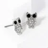Fashnzfab Stone Paved Owl Stud Earrings In Metallic