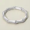 Fashnzfab Stone Paved Pointed Metal Bamboo Stretch Bracelet Clear, Worn Silver In Metallic
