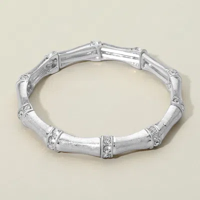 Fashnzfab Stone Paved Pointed Metal Bamboo Stretch Bracelet Clear, Worn Silver In Metallic